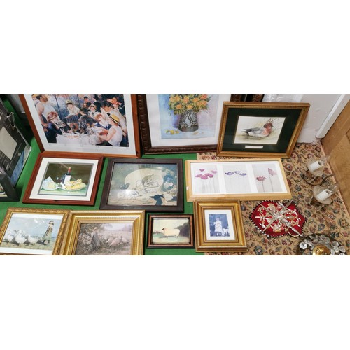 429 - Large quantity of mostly framed and glazed prints inc Renoir print, Lowry print etc.