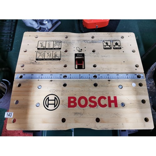 143 - Bosch Home and Garden Work Bench PWB 600 in very good condition, folds away for storage.