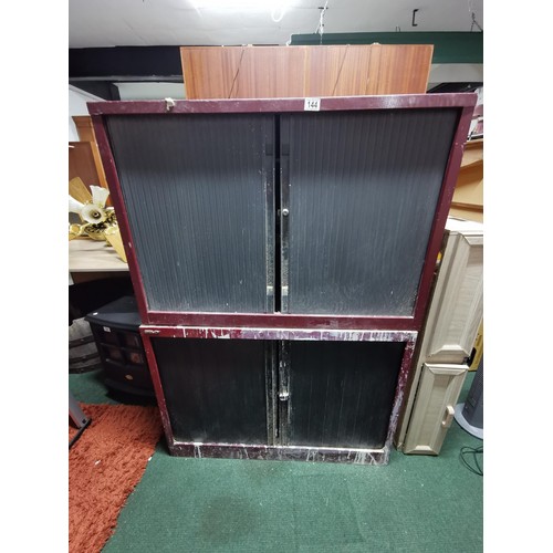 144 - 2x Large red Bisley metal industrial storage units with plastic sliding doors. Measures 69cm height,... 