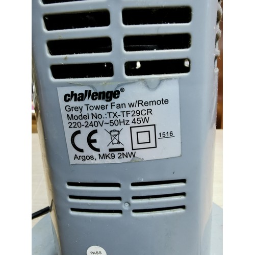 146 - Challenge grey tower fan heater in clean working condition.