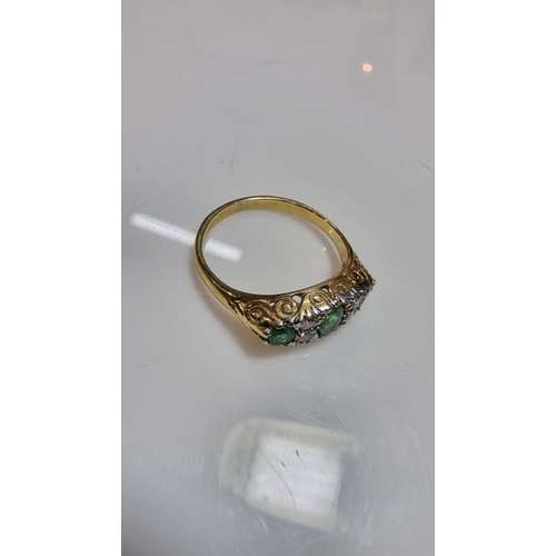 373 - Stunning 18ct yellow gold emerald and diamond ring size L 1/2 inset with 3x green emerald stones 0.3... 