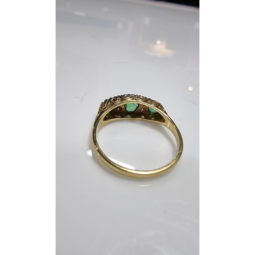 373 - Stunning 18ct yellow gold emerald and diamond ring size L 1/2 inset with 3x green emerald stones 0.3... 