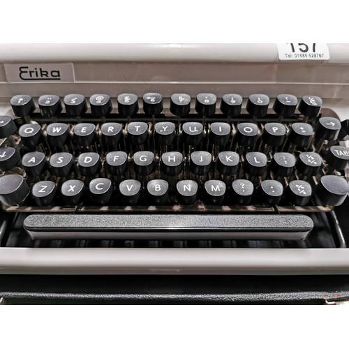 157 - Vintage Erika typewriter model 105 in original leather case, in very good condition. Comes with type... 