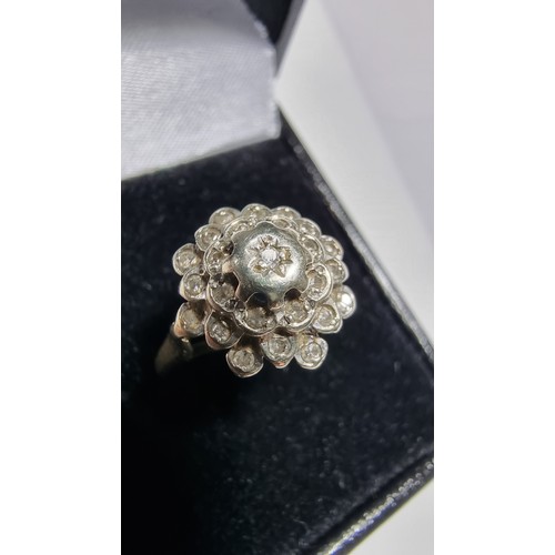 374 - Hallmarked 9ct yellow gold cluster ring inset with 26 small diamonds equating to 0.406ct in excellen... 