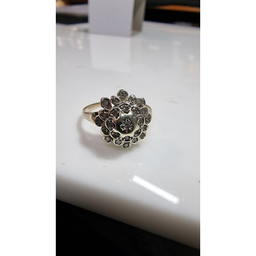 374 - Hallmarked 9ct yellow gold cluster ring inset with 26 small diamonds equating to 0.406ct in excellen... 