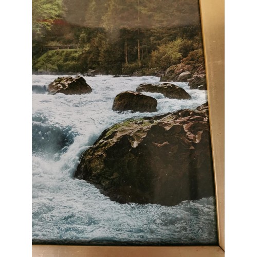 198 - Very large vintage coloured photograph of a white water scene with snow covered mountains in the bac... 