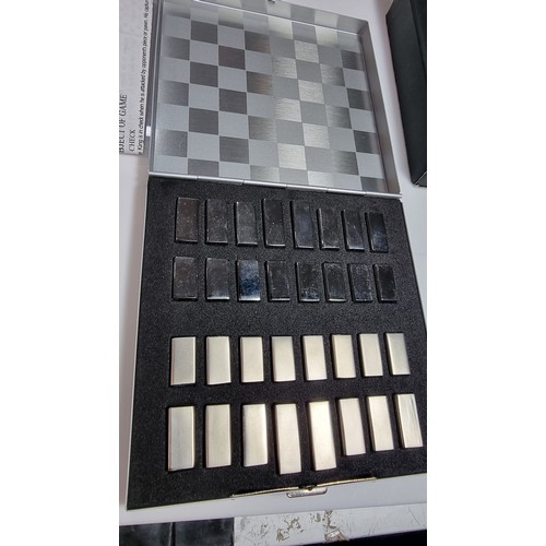 391 - Boxed as new executive chess set in a metal case with metal chess pieces excellent quality ideal for... 