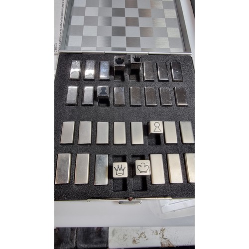 391 - Boxed as new executive chess set in a metal case with metal chess pieces excellent quality ideal for... 