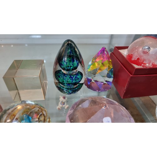 394 - Large quantity of various paperweights along with two rare victorian Price's fairy lamps in blue and... 