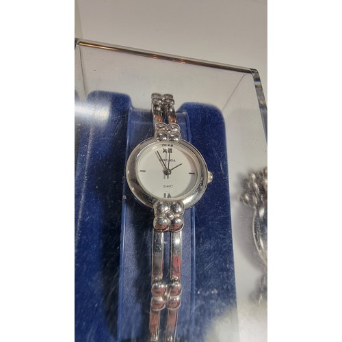 398 - Boxed sekonda ladies watch and a time change watch with an interesting metal strap