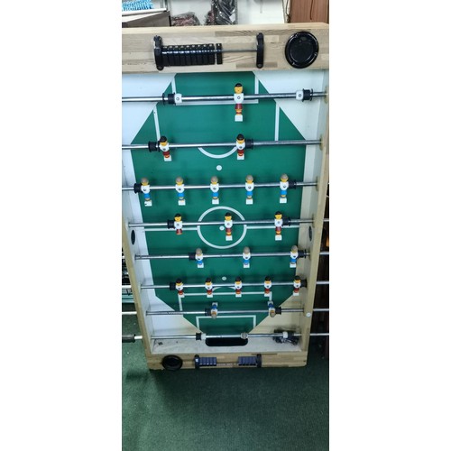 457 - Large foosball / football table complete with the table legs and all players. Height of table not in... 