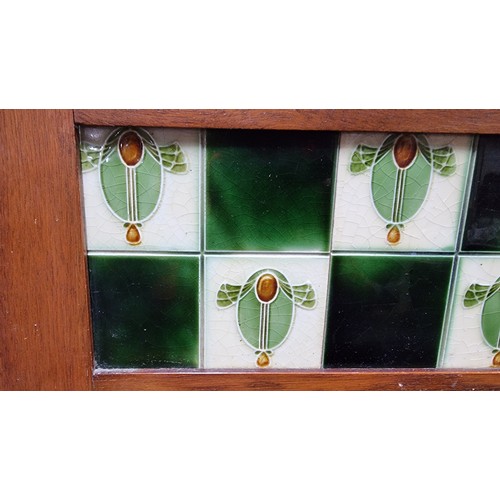 488 - Antique mahogany wash stand with a marble surface and a tiled back containing 5 good tiles by T & R ... 