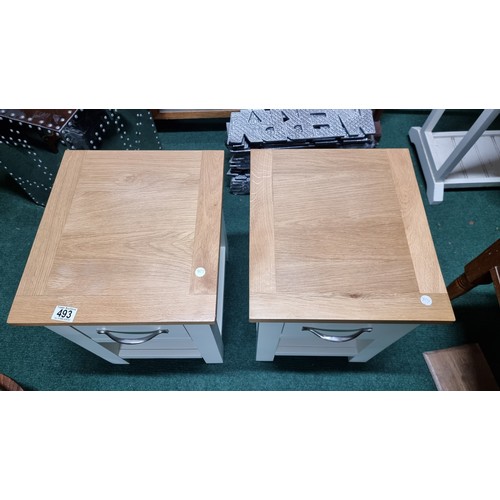 493 - Pair of as new modern bedside white painted  tables with solid oak tops both in excellent condition ... 