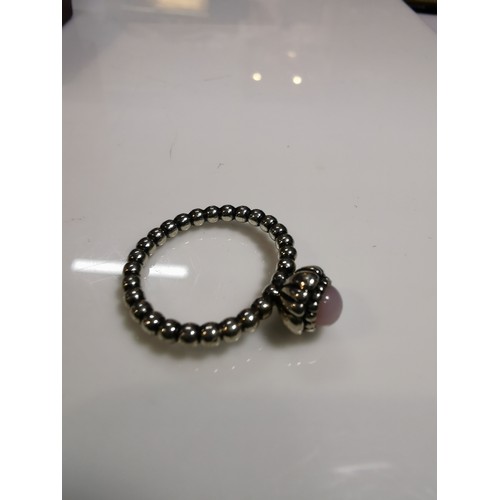 320 - Genuine Pandora 925 silver ring with a bead design and inset with a pink stone, marked 925 ale 54 si... 