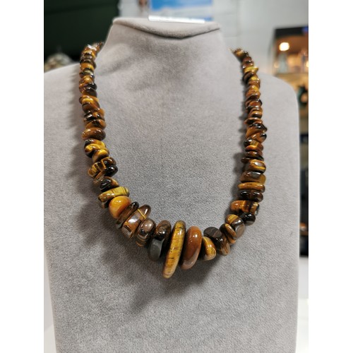 321 - Polished tigers eye beaded necklace with a 925 silver clasp in excellent condition displays well