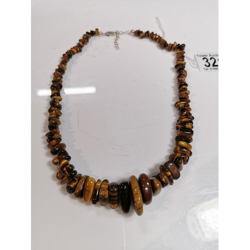 321 - Polished tigers eye beaded necklace with a 925 silver clasp in excellent condition displays well