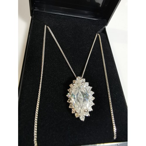 322 - Pretty 925 silver pendant inset with a large cz crystal stone surrounded by smaller cz stones set on... 