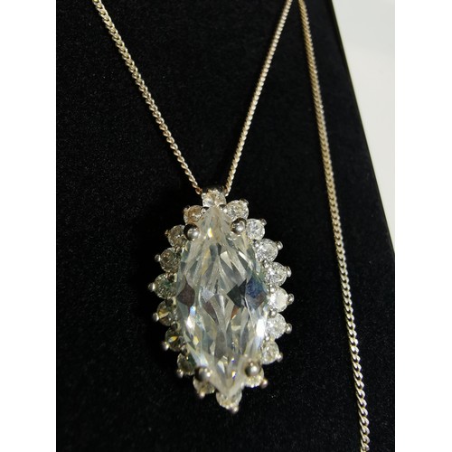 322 - Pretty 925 silver pendant inset with a large cz crystal stone surrounded by smaller cz stones set on... 