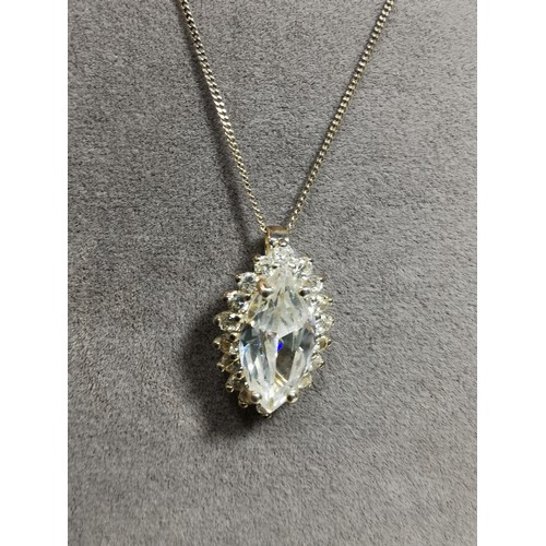 322 - Pretty 925 silver pendant inset with a large cz crystal stone surrounded by smaller cz stones set on... 