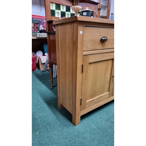 496A - Modern solid light oak side board with two drawers and two doors in excellent clean condition throug... 