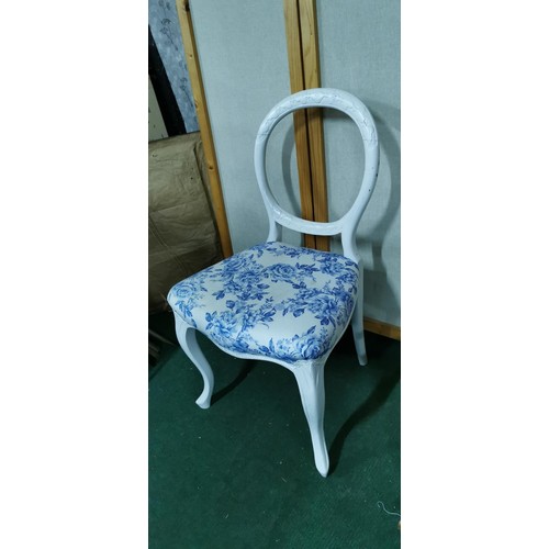 475 - White painted vintage baloon back chair with blue and white upholstery along with a childs rocking c... 