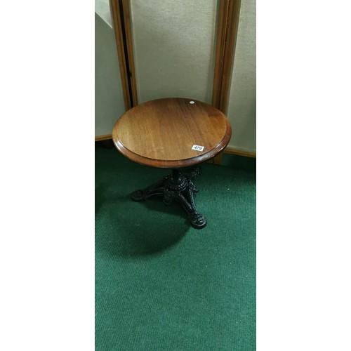 479 - Antique small Mahogany topped bar grog table with an ornate cast iron base in good overall condition... 