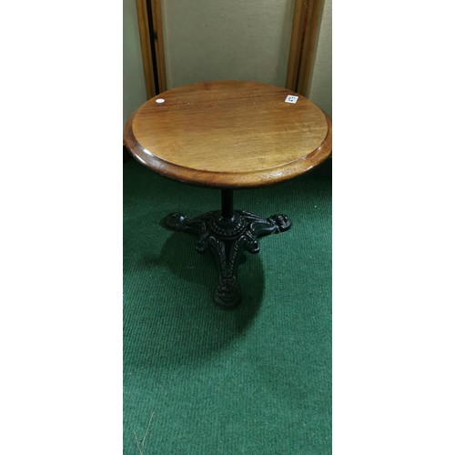 479 - Antique small Mahogany topped bar grog table with an ornate cast iron base in good overall condition... 