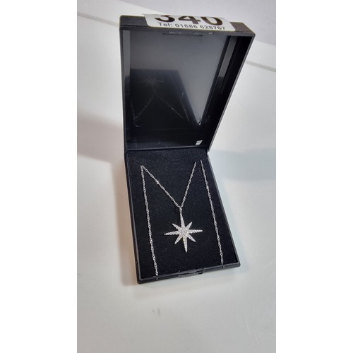 404 - 925 silver winter star pendant in set with cz crystal stones on an 18in 925 silver chain boxed in go... 