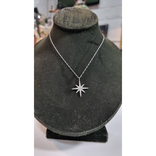 404 - 925 silver winter star pendant in set with cz crystal stones on an 18in 925 silver chain boxed in go... 