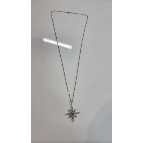 404 - 925 silver winter star pendant in set with cz crystal stones on an 18in 925 silver chain boxed in go... 