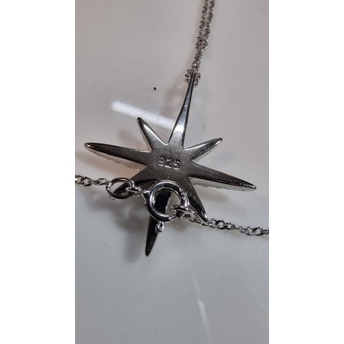 404 - 925 silver winter star pendant in set with cz crystal stones on an 18in 925 silver chain boxed in go... 