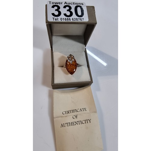 405 - Good quality 925 silver dress ring inset with a large oval genuine baltic amber stone with a COA fro... 