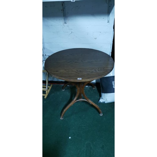 499 - Good quality solid oak pub table on a Bentwood 4 leg base in good overall condition. Height of 76cm ... 