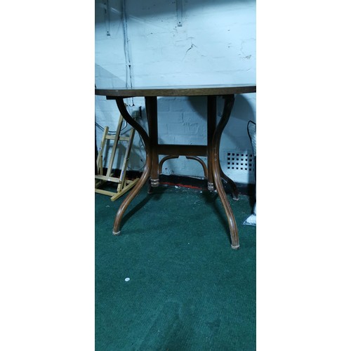 499 - Good quality solid oak pub table on a Bentwood 4 leg base in good overall condition. Height of 76cm ... 