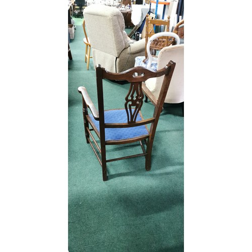 477 - Well carving Antique oak Carver side chair in good overall condition. Height of 87cm x 57cm width.