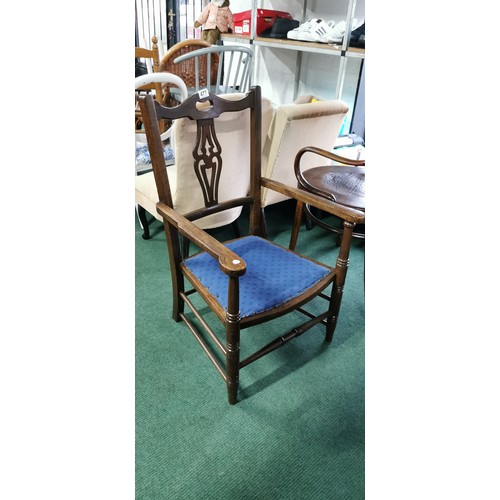 477 - Well carving Antique oak Carver side chair in good overall condition. Height of 87cm x 57cm width.