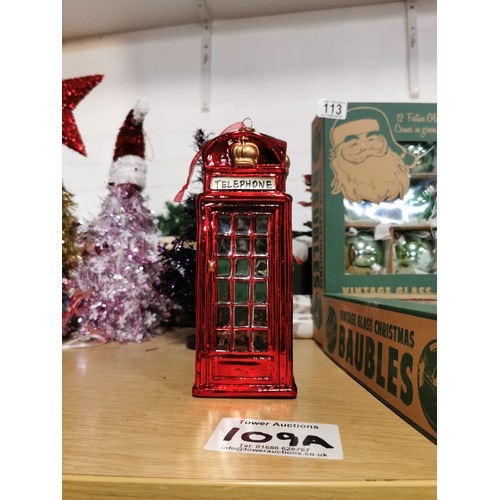 109A - Large Red Phone Box Christmas Bauble with a miss print on one of the sides that says 