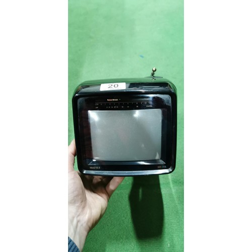 20 - Matsui, Model 6091 colour retro mini portable television complete with carry handle, aerial and all ... 