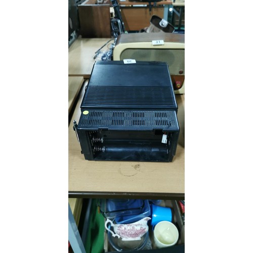 30 - Battery operated Matsui MCT640 Portable television with AM/FM radio and carry handle. Due to the vin... 