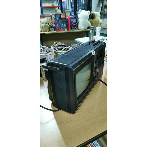 38 - Vintage Sharp portable TV / Radio / auto cassette recorder, Cassette deck missing cover, due to the ... 