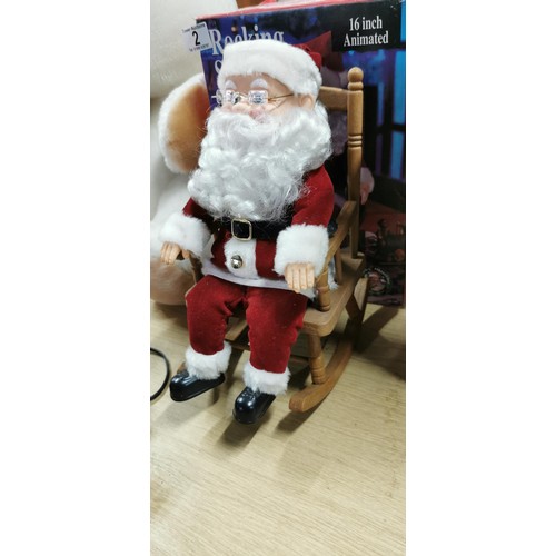 2 - Boxed rocking Santa Claus - 16 Inch sound activated and animated.