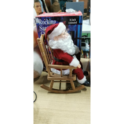 2 - Boxed rocking Santa Claus - 16 Inch sound activated and animated.