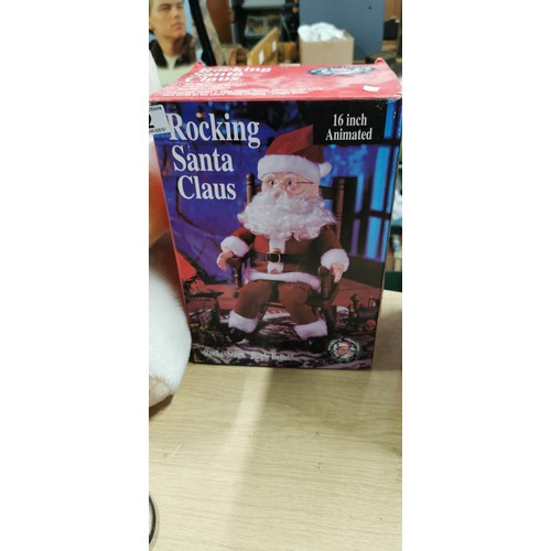 2 - Boxed rocking Santa Claus - 16 Inch sound activated and animated.