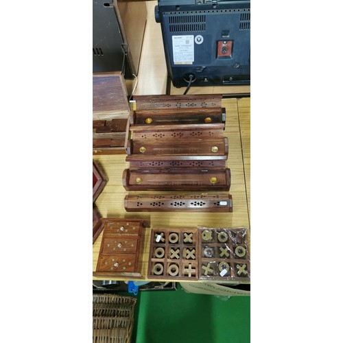 48 - Quantity of hand carved wooden items with brass inlay inc 4x carved incense boxes, Naughts and Cross... 