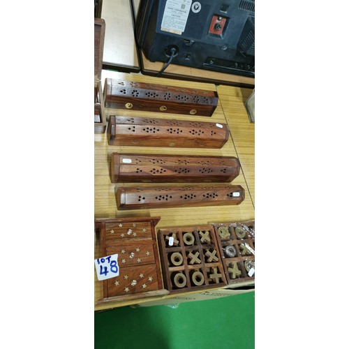 48 - Quantity of hand carved wooden items with brass inlay inc 4x carved incense boxes, Naughts and Cross... 