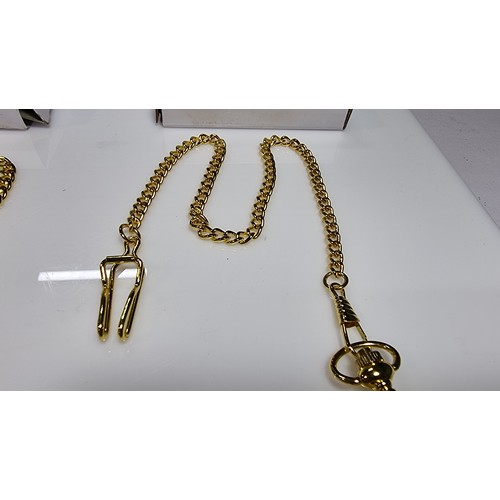 334 - 2x gold tone pocket watches and chains both with their original boxes one is new and unused with cel... 