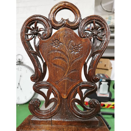 485 - Well carved antique Black Forest mahogany musical chair in the shape of a small Victorian hall chair... 