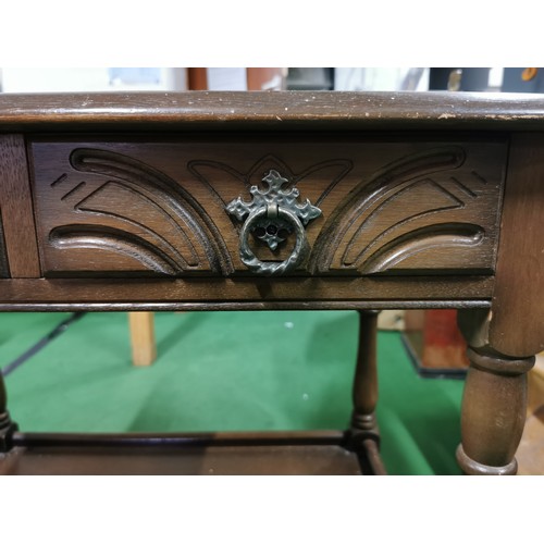 489 - Two drawer Priory side table with good quality carving throughout. Measures 66.5cm height, 67cm leng... 