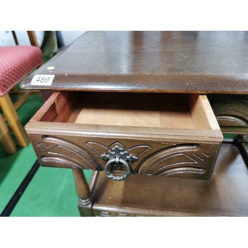 489 - Two drawer Priory side table with good quality carving throughout. Measures 66.5cm height, 67cm leng... 