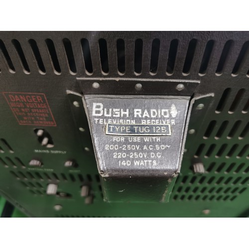 40A - Vintage 1950s cased Bush Radio black & white television - Type TUG 12B. Two doors to the front revea... 